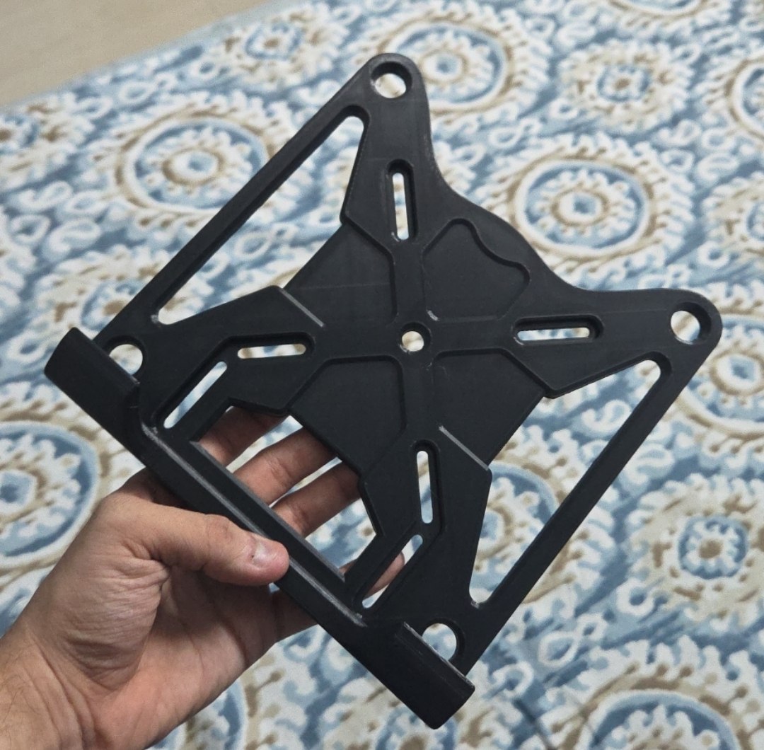 A VESA mount laptop stand (good for those VESA monitor arms)
