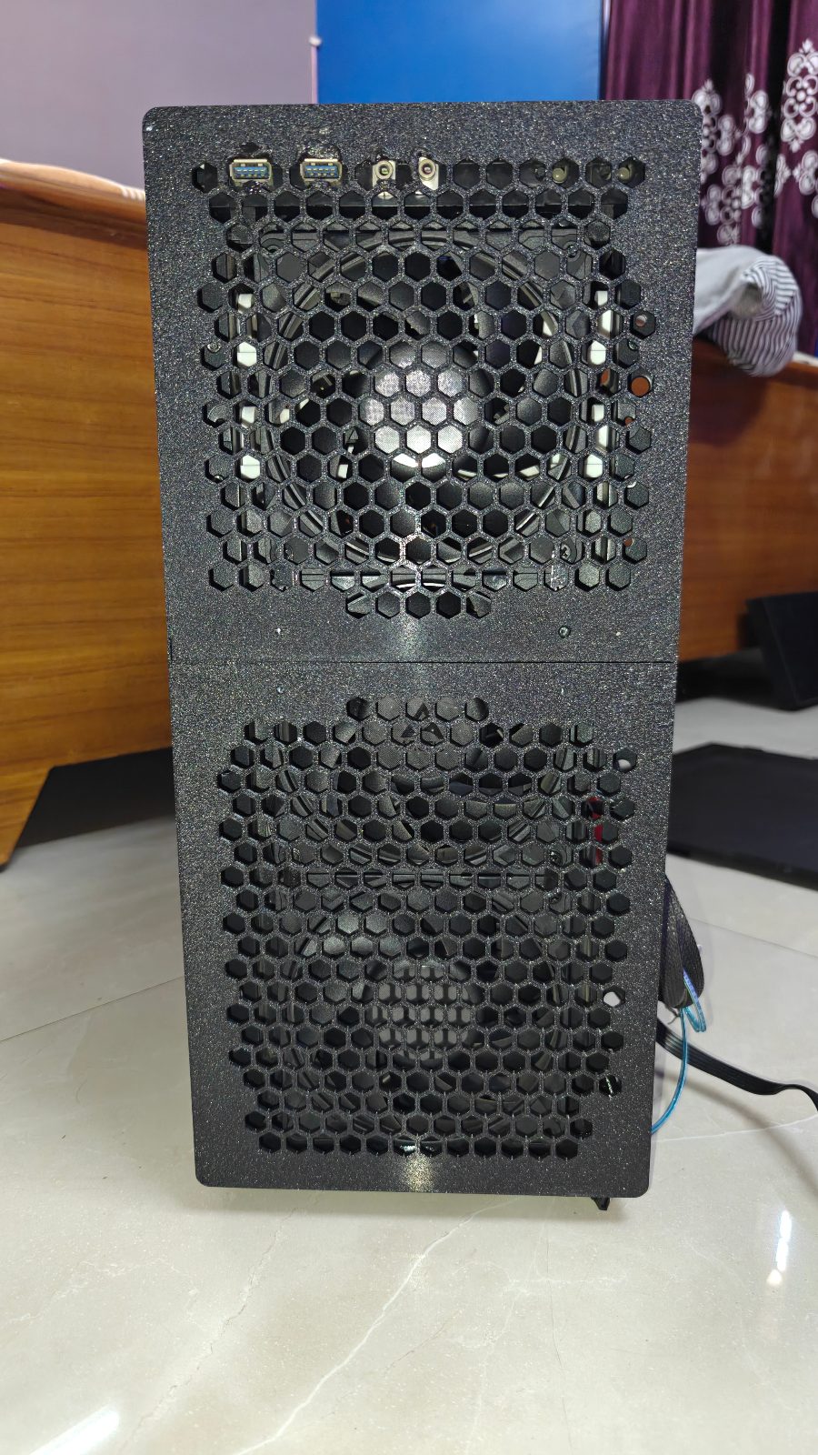 Custom designed mesh front panel for Corsair Carbide 100R. A face only a mother could love